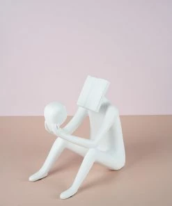 The-Golden-Triangle-India Man Reading A Book - White