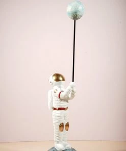 The Golden Triangle India Astronaut | Spaceman Holding An Earth Balloon