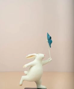 The Golden Triangle India Rabbit Holding A Pinwheel - Blue Artefacts