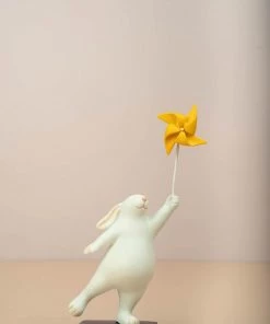 The Golden Triangle India Rabbit Holding A Pinwheel - Yellow Artefacts