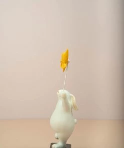 The Golden Triangle India Rabbit Holding A Pinwheel - Yellow Artefacts