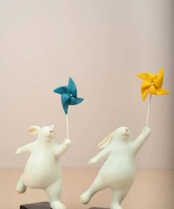 The Golden Triangle India Rabbit Holding A Pinwheel - Yellow Artefacts