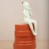 The Golden Triangle India Artefacts Girl Sitting On A Disk - Coral