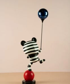 The-Golden-Triangle-India Artefacts Coco Holding A Balloon