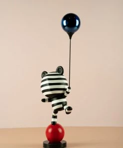 The-Golden-Triangle-India Artefacts Coco Holding A Balloon