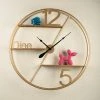 The Golden Triangle India Gaia Metal Wall Clock With Shelf - Gold