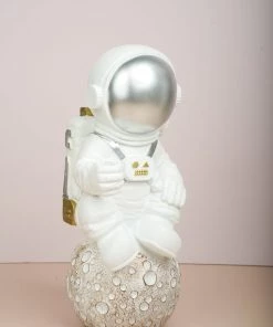 The Golden Triangle India Astronaut | Figurine Sitting On The Moon - Silver