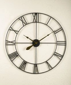 The Golden Triangle India Wall Clocks Cosmo Metal Wall Clock - Black With Gold Hands