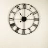 The Golden Triangle India Wall Clocks Cosmo Metal Wall Clock - Black 1 The Golden Triangle India Wall Clocks Cosmo Metal Wall Clock - Black